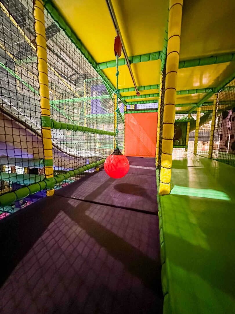 Red Ariel Glide in Cannon Hall Farm's indoor softplay area, designed by Play Creations