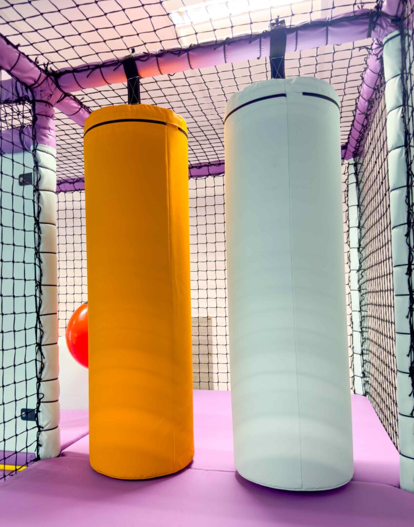 Orange and white duo bashbags at Trinity Schools indoor softplay.