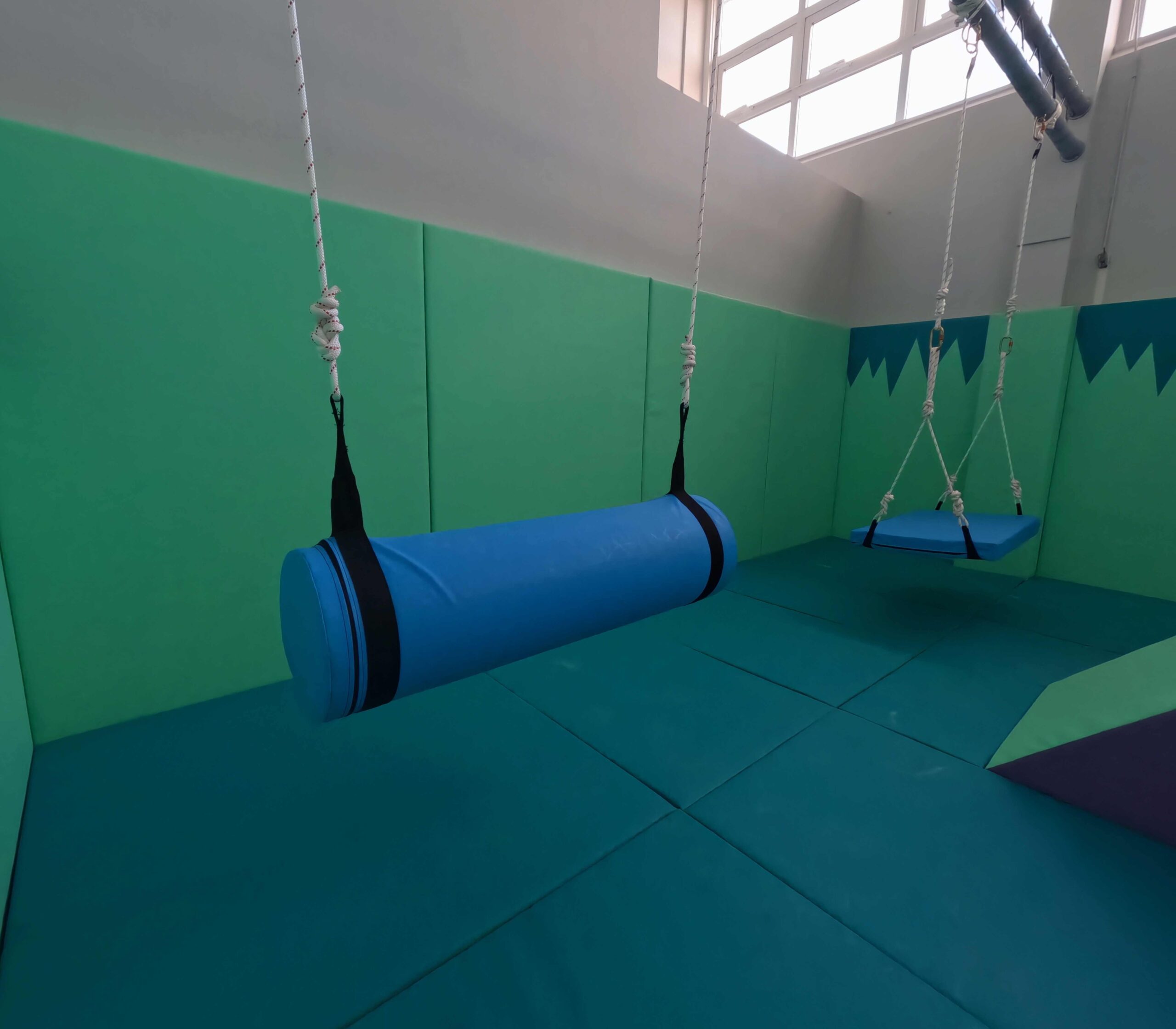 Hanging Sensory Log found at Rushall Primary School's Movement room designed by Play Creations Ltd.