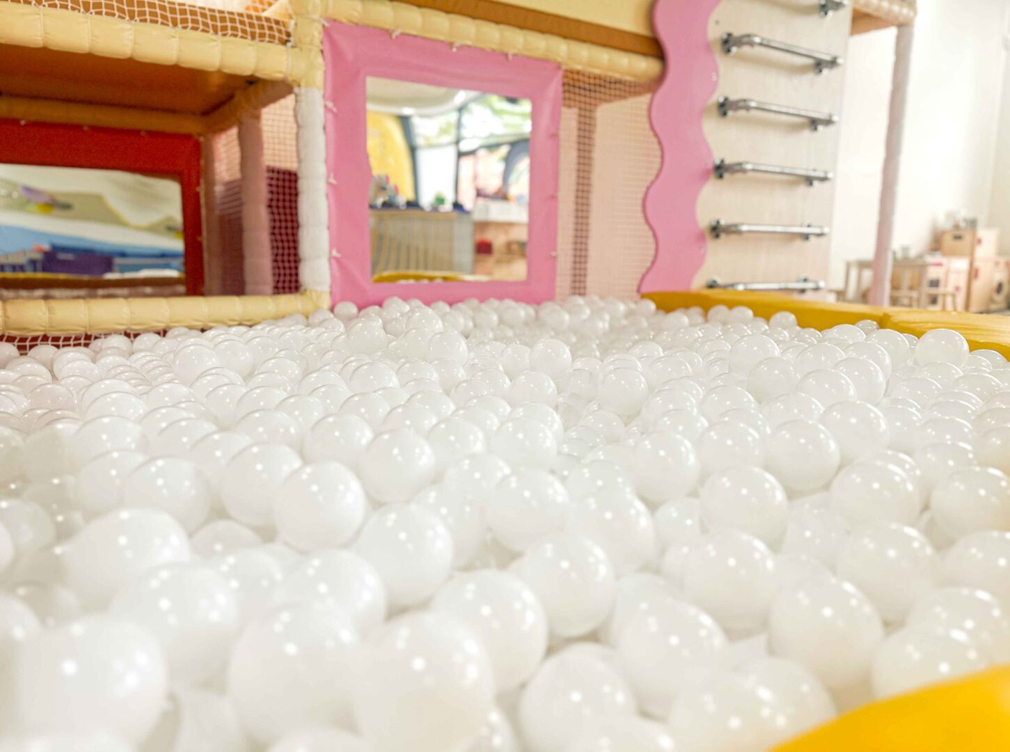 White ball pool balls found at the front of the softplay next to the slide. Designed by Play Creations.