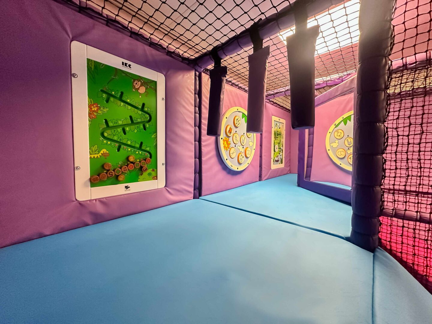 Hanging Snakes and Interactive Wall Games at Old Hall School's softplay room designed by Play Creations Ltd.