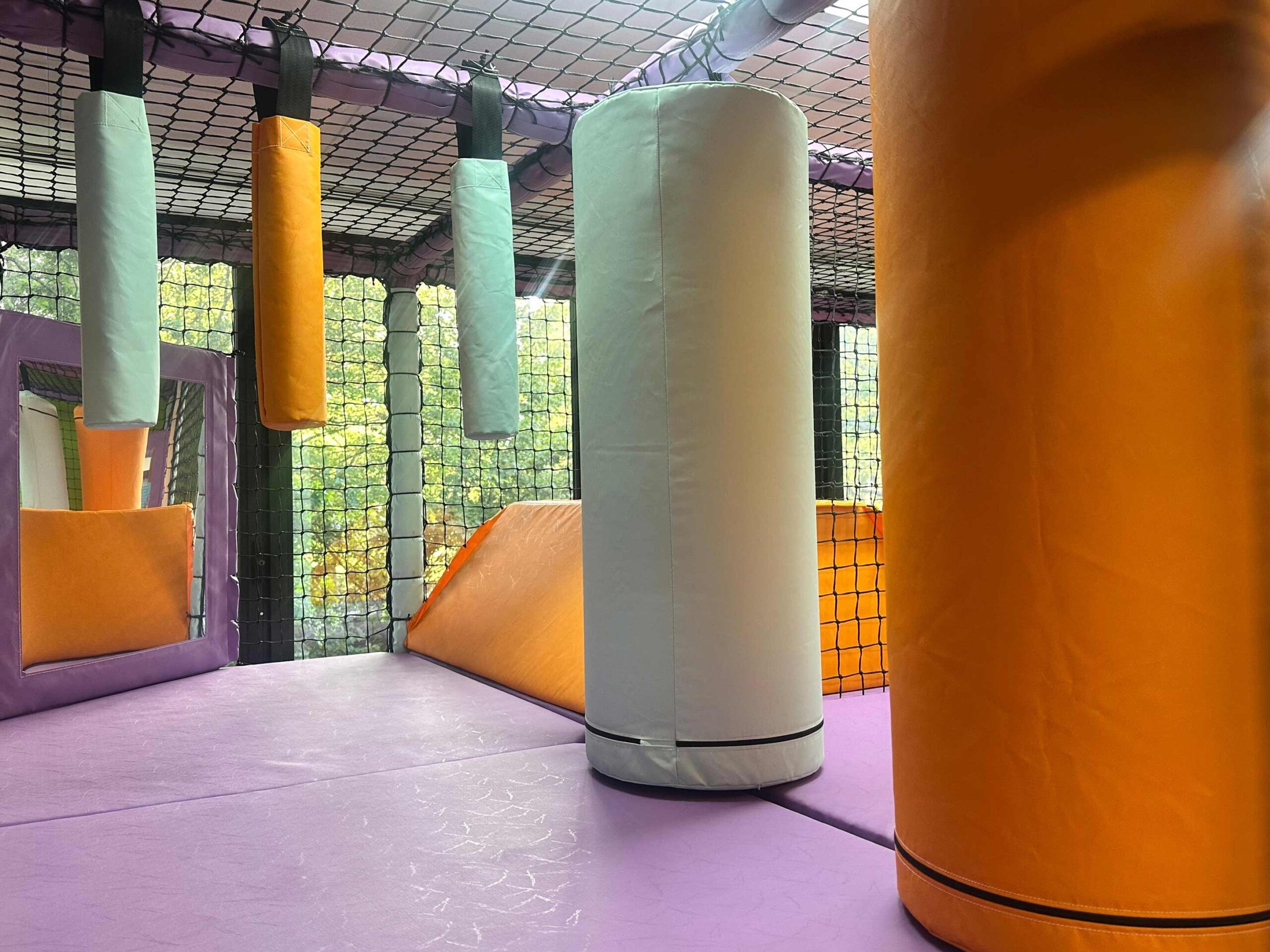 Vertical Rollers and Hanging Snakes at Serenity School's softplay designed by Play Creations Ltd.